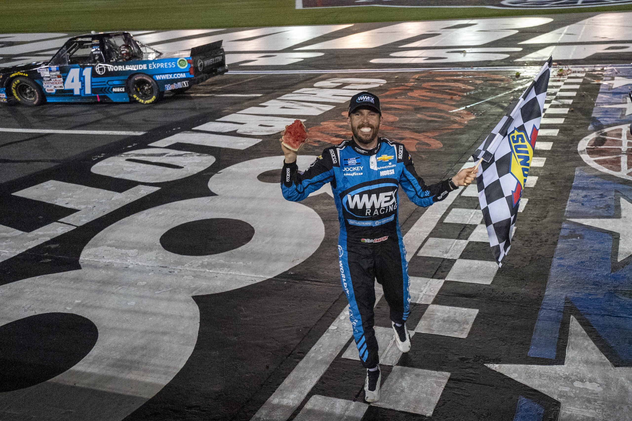 Ross Chastain celebrates his win for the North Carolina Education Lottery 200 at Charlotte Motor Speedway in Concord, NC.